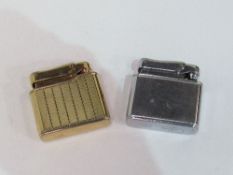 2 stainless steel & gold plated Colibri 1930's petrol lighters. Estimate £15-25