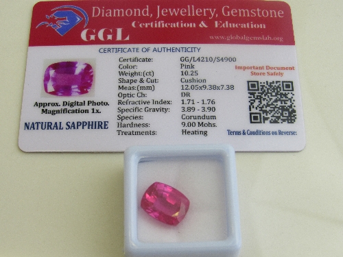 Natural cushion cut loose pink sapphire, 10.25ct with certificate. Estimate £50-70