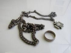 Silver chain with a silver cross; silver watch chain with a silver bear charm & a silver gent's