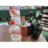 Cockburn's port - 2x 1 litre; Gilbey's Gin - 1 litre; Johnnie Walker Red Label Whisky - 75cl & a
