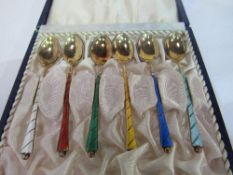 A cased set of Danish silver gilt & enamel teaspoons. Estimate £40-60