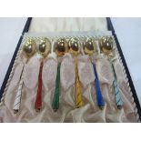 A cased set of Danish silver gilt & enamel teaspoons. Estimate £40-60