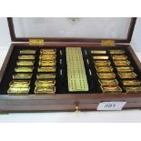 Set of Franklin Mint 'Imperial Dominoes by The House of Fabergé', in wooden case. Estimate £150-200