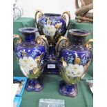 Trio of blue glazed, gold & floral decorated vases.