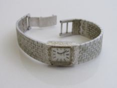 Rotary lady's wristwatch in white metal case & bracelet. Estimate £20-30