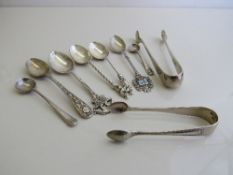 5 silver teaspoons; 2 silver condiment spoons & 2 silver sugar tongs, total weight 4oz. Estimate £