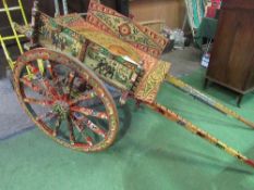 Italian donkey cart. A very decorative continental cart painted with a base colour of dark red and