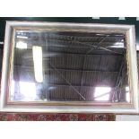 Silver coloured framed bevel edged wall mirror, 72cms x 102cms. Estimate £30-40