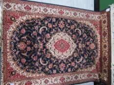 Blue ground Keshan carpet, 230 x 160. Estimate £40-50