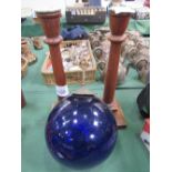 A pair of oak candlesticks & a blue glass float. Estimate £20-30