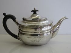 Silver teapot with wooden handle & knob, hallmarked London 1929, inscribed, total weight 17.5oz.