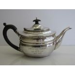 Silver teapot with wooden handle & knob, hallmarked London 1929, inscribed, total weight 17.5oz.