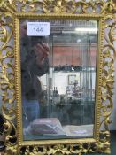19th century gilt open scroll work framed wall mirror, 50cms x 36cms. Estimate £40-60