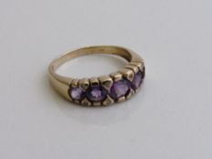 9ct gold ring with 5 amethysts, size T, weight 3.2gms. Estimate £100-130