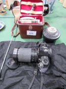 Canon A1 camera; Tokina S2X28-200mm lens; Eumig C3R 8mm cine camera in original case & Paterson 35
