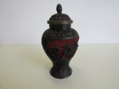 Chinese cinnabar vase with lid, black & red lacquered. Estimate £25-35