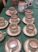 Denby coffee pot and Denby tea cups and saucers. Est 20-30