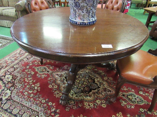 Victorian mahogany circular tilt top table on heavy turned column to 3 shaped feet to casters,