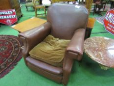 Brown faux leather armchair. Estimate £10-20