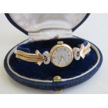 Rolex Precision lady's manual wrist watch in diamond mounted 18ct gold case & strap, going order, in