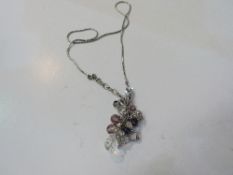 Circa 1980 Swarovski silver tone necklace with long pendant. Est 20-30