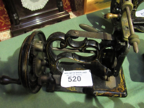 A small sewing machine with no marks or inscriptions. Est £20-40 plus VAT on the hammer price