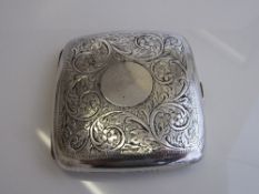 Silver cigarette case, Birmingham 1918 with floral decoration front & back, weight 2.9oz.