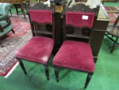 2 Edwardian chairs, upholstered in red velvet. Estimate £15-20