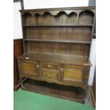 Oak dresser with 2 open shelves over 2 cupboards flanking 2 drawers & display shelf beneath, 153 x