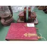 Red leather bound photograph album, pair of book ends and a hurricane lamp. Est 20-40