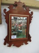 Mahogany Chippendale-style wall mirror. Estimate £10-20