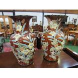 Pair of large floral pattern vases, height 52cms. Estimate £40-60