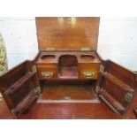 Mahogany smoker's cabinet with brass handles & carved door panels, 37 x 21 x 27cms. Estimate £30-50