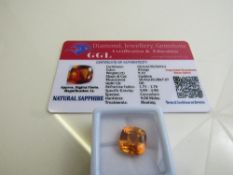 Cushion cut orange sapphire, weight 9.10ct with certificate. Estimate £40-50