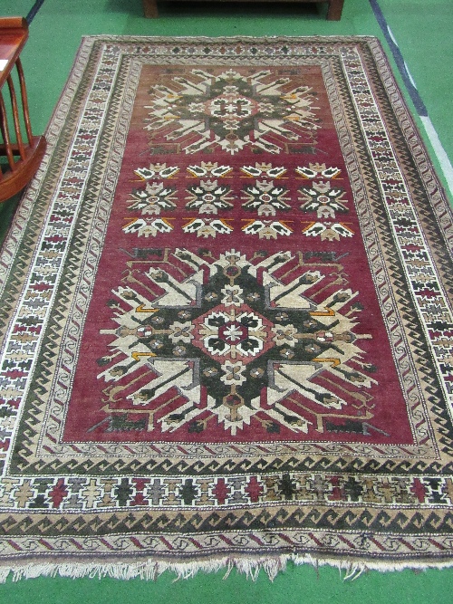 Dark red ground Turkish rug, 240 x 160cms. Estimate £20-30