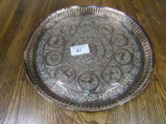 Circular decorated copper tray, diameter 41cms. Estimate £10-20