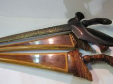 Collection of 6 Kris daggers, a reproduction dagger & a Rolls razor