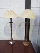 A pair of twisted bine tall candlesticks, height 66cms. Estimate £30-40