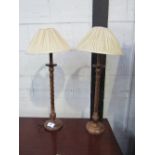A pair of twisted bine tall candlesticks, height 66cms. Estimate £30-40