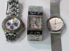 Guess Box containing 3 gent's fashion watches. Estimate £20-30