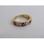 18ct gold band set with 4 rubies & 3 diamonds, size M, weight 6.1gms. Estimate £650-700