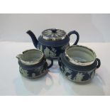 Wedgwood Jasper ware teapot, milk jug, and sugar bowl with silver rims, marked Chester 1908 (sugar