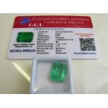 Emerald cut loose green emerald, 8.90ct with certificate. Estimate £40-50