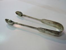 Pair of Victorian silver hallmarked sugar tongs, London. Est 10-20