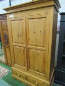 Pine double wardrobe over 2 drawers to base, 113 x 56 x 201cms. Estimate £40-60