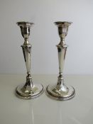 Pair of silver fluted candlesticks, hallmarked Sheffield 1964, c/w sconces, height 21cms.