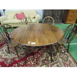 Ercol 'Old Colonial' drop side table with cross stretcher, 107cms diameter (open) x 71cms & 4