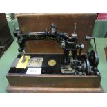 Wheeler and Wilson 8 domestic sewing machine. Est £20-40 plus VAT on the hammer price