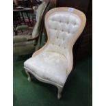 Beech framed cream upholstered slipper shaped bedroom chair. Estimate £20-30