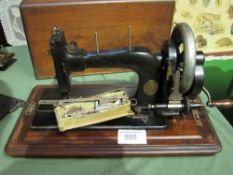 Pfaff sewing machine with a wooden box. Est £20-40 plus VAT on the hammer price